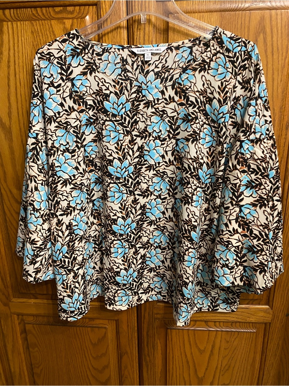 Elizabeth and James Blue Floral V-Neck Blouse on Cream